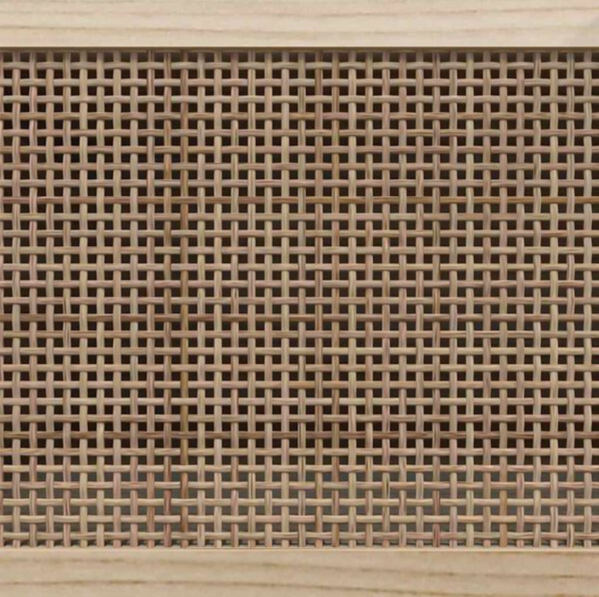 Vue rapprochée du cannage en rotin naturel tressé utilisé sur les portes du meuble TV noir et bois naturel